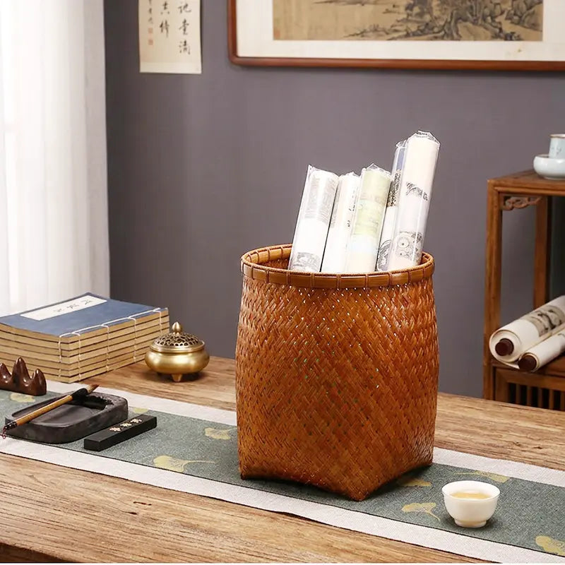 A study, with a bamboo-woven storage picture frame displayed on the desk.